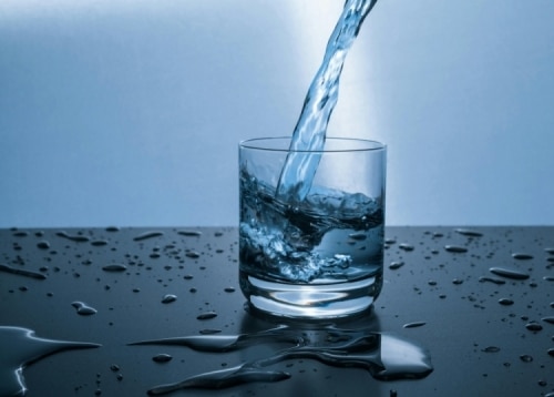 Water being poured into a glass
